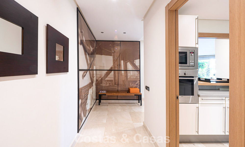 Exclusive ground-floor apartment with private garden for sale on Marbella’s Golden Mile 806197