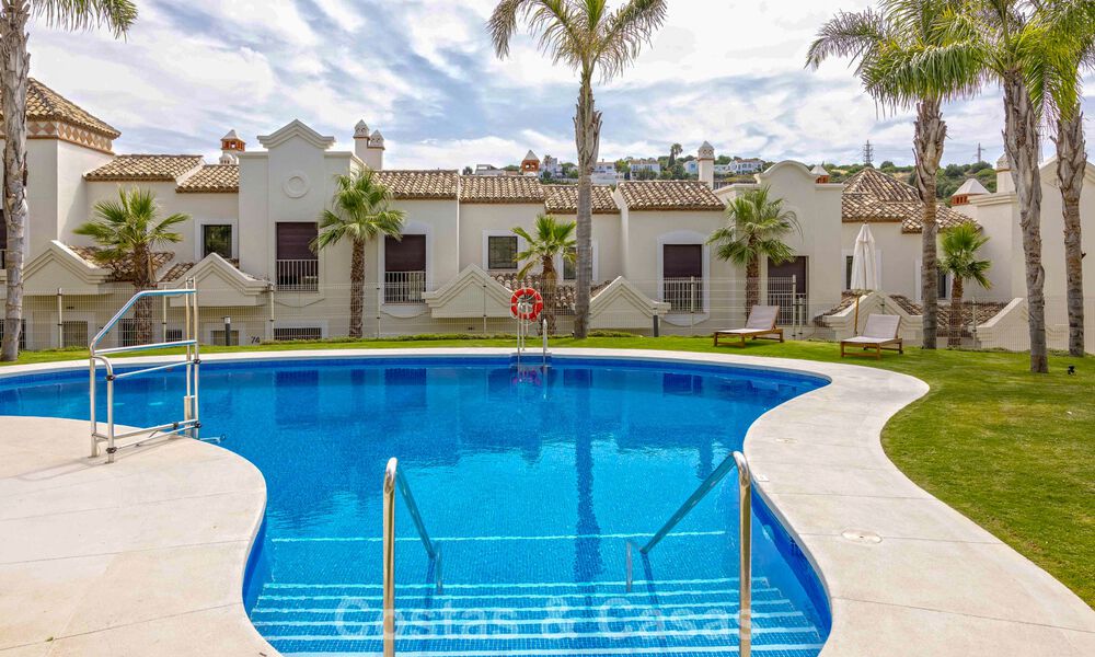 Move-in ready townhouses with mediterranean architecture for sale directly on the golf course in Estepona 806864