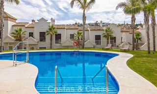 Move-in ready townhouses with mediterranean architecture for sale directly on the golf course in Estepona 806864 