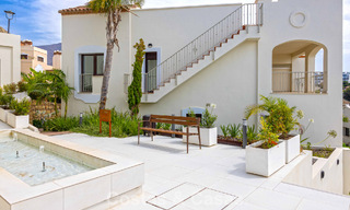 Move-in ready townhouses with mediterranean architecture for sale directly on the golf course in Estepona 806868 