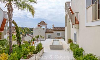 Move-in ready townhouses with mediterranean architecture for sale directly on the golf course in Estepona 806869 