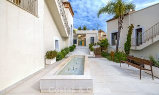 Move-in ready townhouses with mediterranean architecture for sale directly on the golf course in Estepona 806871 