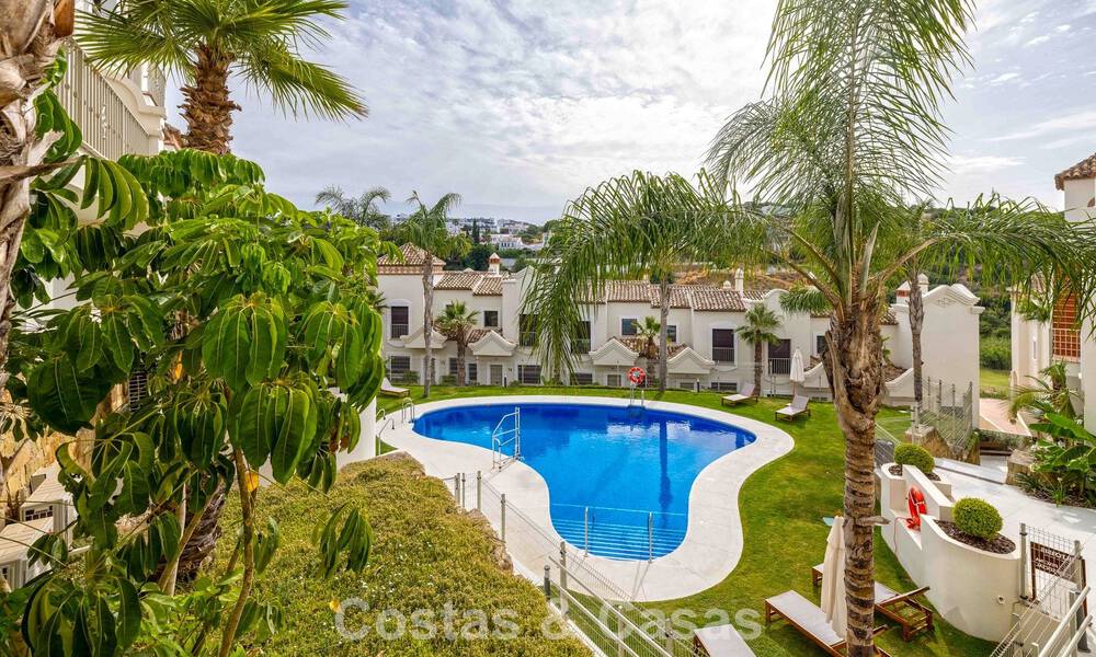 Move-in ready townhouses with mediterranean architecture for sale directly on the golf course in Estepona 806873