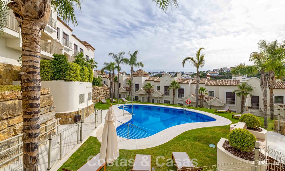 Move-in ready townhouses with mediterranean architecture for sale directly on the golf course in Estepona 806874