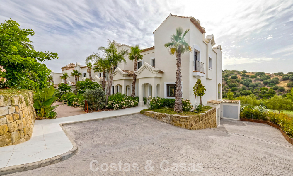 Move-in ready townhouses with mediterranean architecture for sale directly on the golf course in Estepona 806876