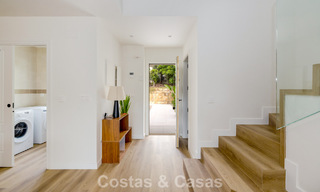 Move-in ready townhouses with mediterranean architecture for sale directly on the golf course in Estepona 806883 
