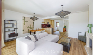Move-in ready townhouses with mediterranean architecture for sale directly on the golf course in Estepona 806893 