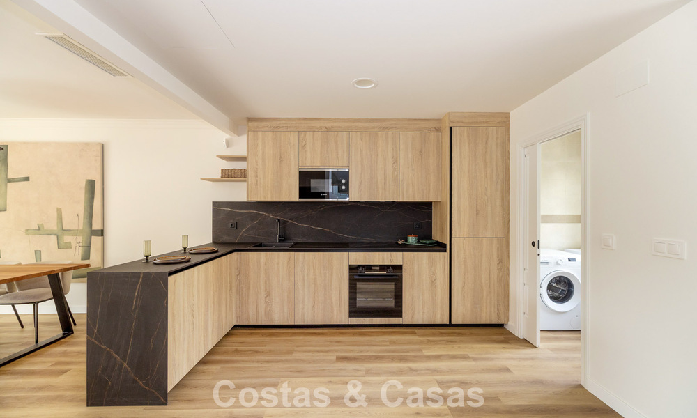 Move-in ready townhouses with mediterranean architecture for sale directly on the golf course in Estepona 806896