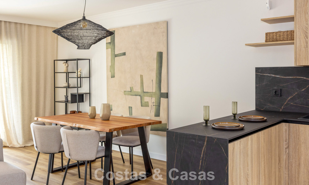 Move-in ready townhouses with mediterranean architecture for sale directly on the golf course in Estepona 806897
