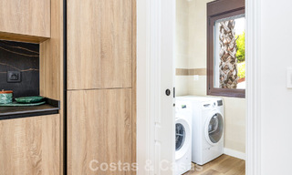 Move-in ready townhouses with mediterranean architecture for sale directly on the golf course in Estepona 806898 
