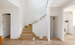 Move-in ready townhouses with mediterranean architecture for sale directly on the golf course in Estepona 806904 