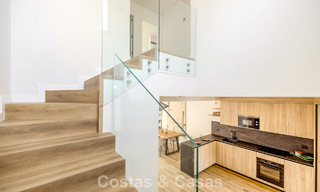 Move-in ready townhouses with mediterranean architecture for sale directly on the golf course in Estepona 806909 
