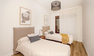 Move-in ready townhouses with mediterranean architecture for sale directly on the golf course in Estepona 806913 