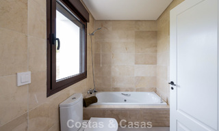 Move-in ready townhouses with mediterranean architecture for sale directly on the golf course in Estepona 806923 