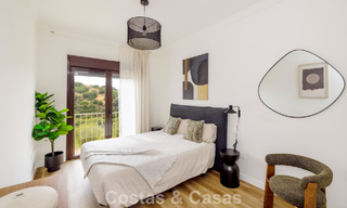 Move-in ready townhouses with mediterranean architecture for sale directly on the golf course in Estepona 806924 
