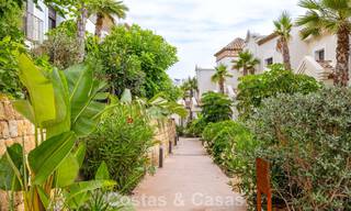 Move-in ready townhouses with mediterranean architecture for sale directly on the golf course in Estepona 806927 