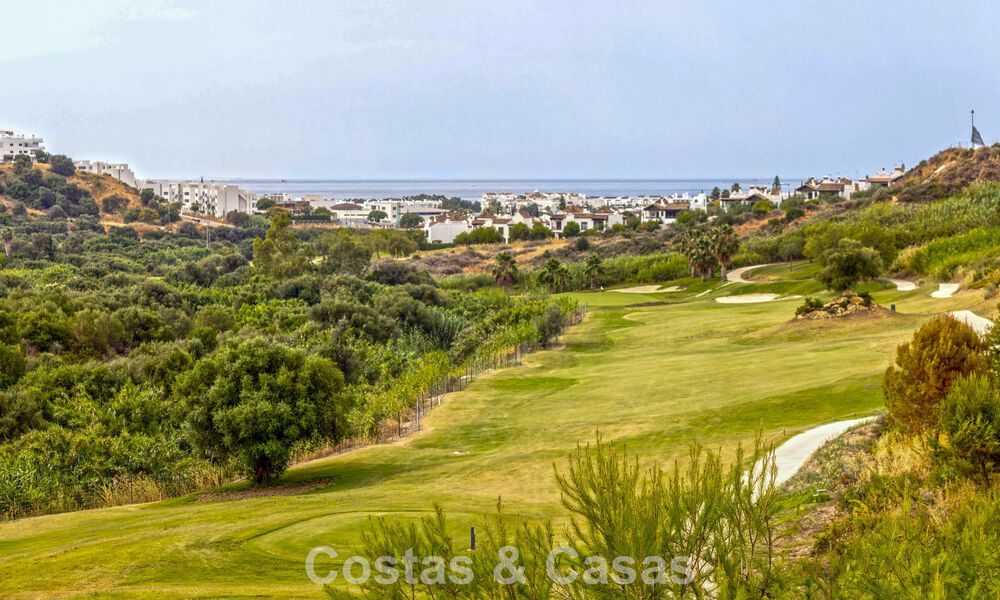 Move-in ready townhouses with mediterranean architecture for sale directly on the golf course in Estepona 806933