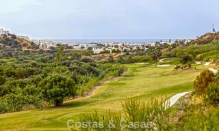 Move-in ready townhouses with mediterranean architecture for sale directly on the golf course in Estepona 806933 