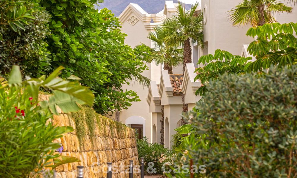 Move-in ready townhouses with mediterranean architecture for sale directly on the golf course in Estepona 806935