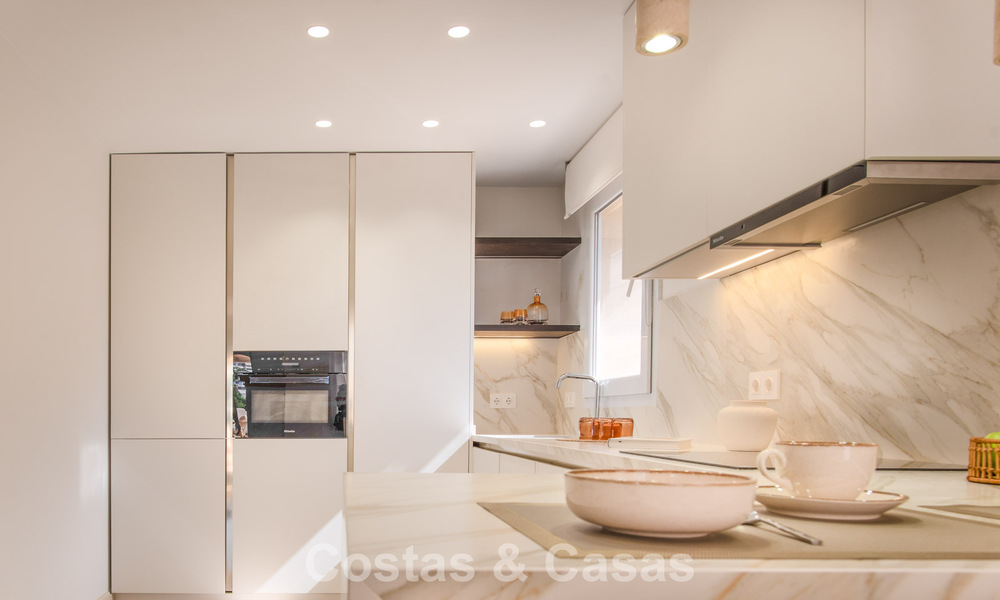 Contemporary renovated, luxury duplex penthouse with large terraces for sale in the heart of Nueva Andalucía’s Golf Valley, Marbella 807008