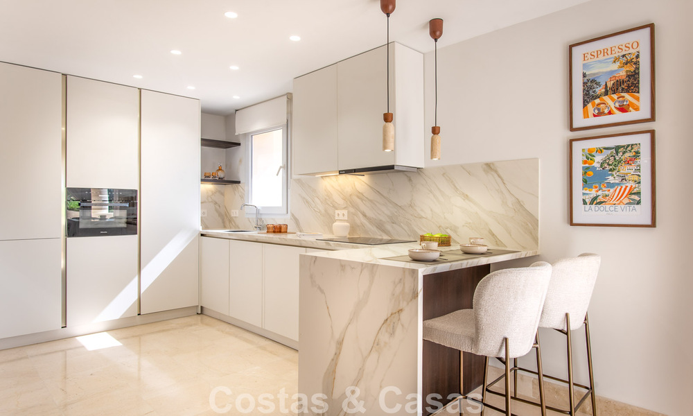 Contemporary renovated, luxury duplex penthouse with large terraces for sale in the heart of Nueva Andalucía’s Golf Valley, Marbella 807009