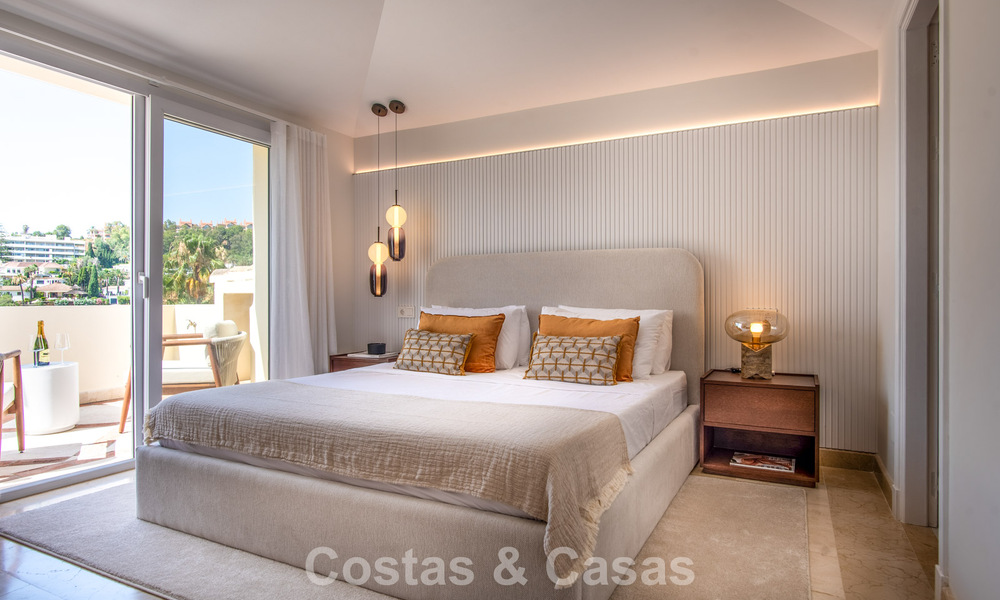 Contemporary renovated, luxury duplex penthouse with large terraces for sale in the heart of Nueva Andalucía’s Golf Valley, Marbella 807016