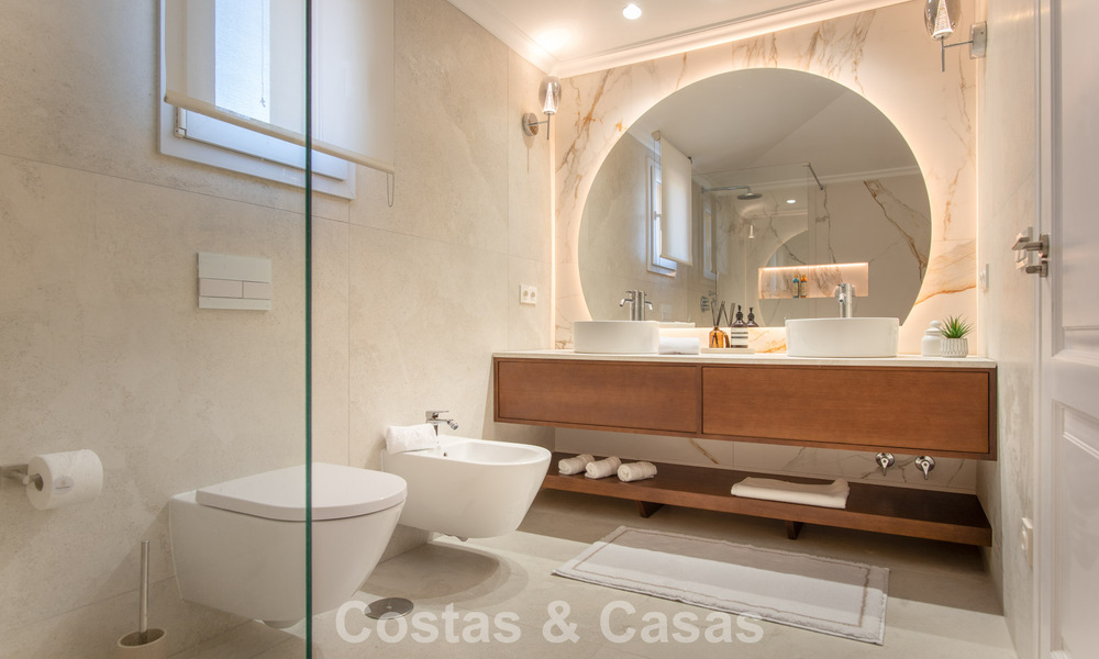 Contemporary renovated, luxury duplex penthouse with large terraces for sale in the heart of Nueva Andalucía’s Golf Valley, Marbella 807018