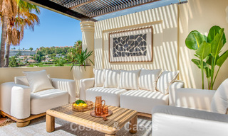 Contemporary renovated, luxury duplex penthouse with large terraces for sale in the heart of Nueva Andalucía’s Golf Valley, Marbella 807022 