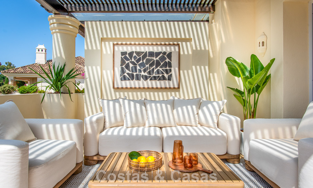 Contemporary renovated, luxury duplex penthouse with large terraces for sale in the heart of Nueva Andalucía’s Golf Valley, Marbella 807023