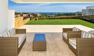 Modern luxury frontline golf apartments with stunning golf and sea views for sale in Marbella - Benahavis 23884 