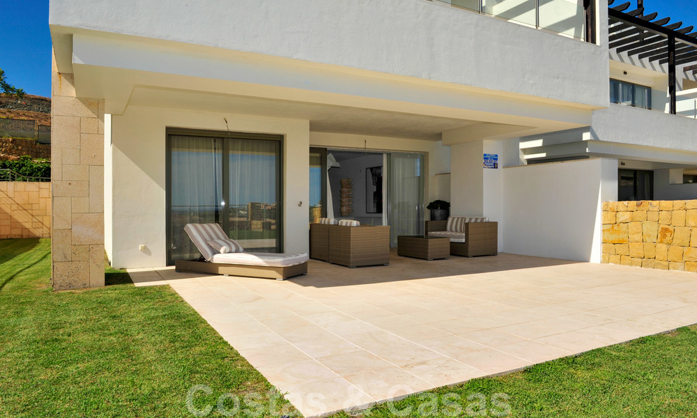 Modern luxury frontline golf apartments with stunning golf and sea views for sale in Marbella - Benahavis 23886