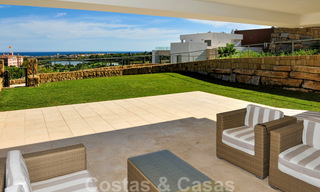 Modern luxury frontline golf apartments with stunning golf and sea views for sale in Marbella - Benahavis 23912 