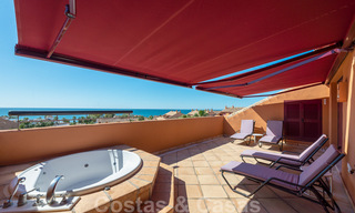 Luxury apartments for sale near the beach in a prestigious complex, just east of Marbella town 22988 